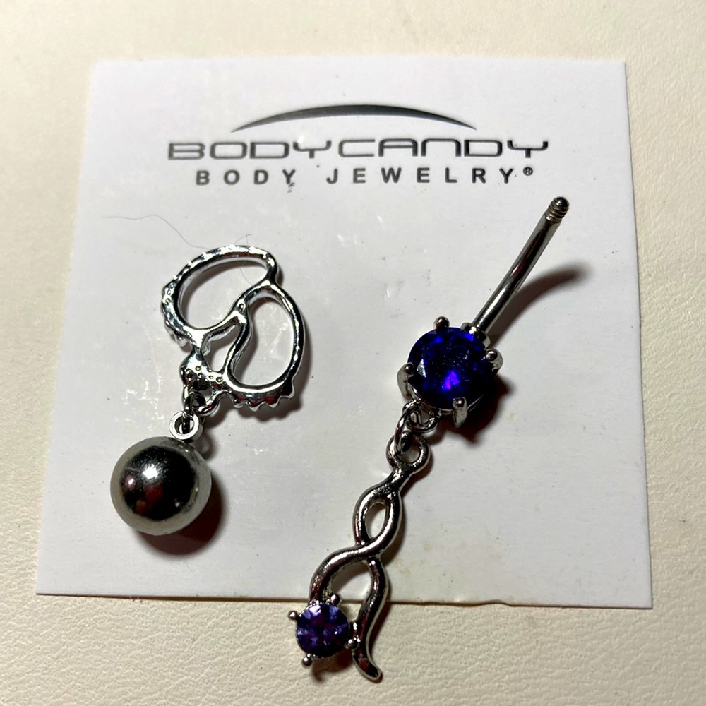 Body Candy body jewelry. Silver tone with blue crystal #1735